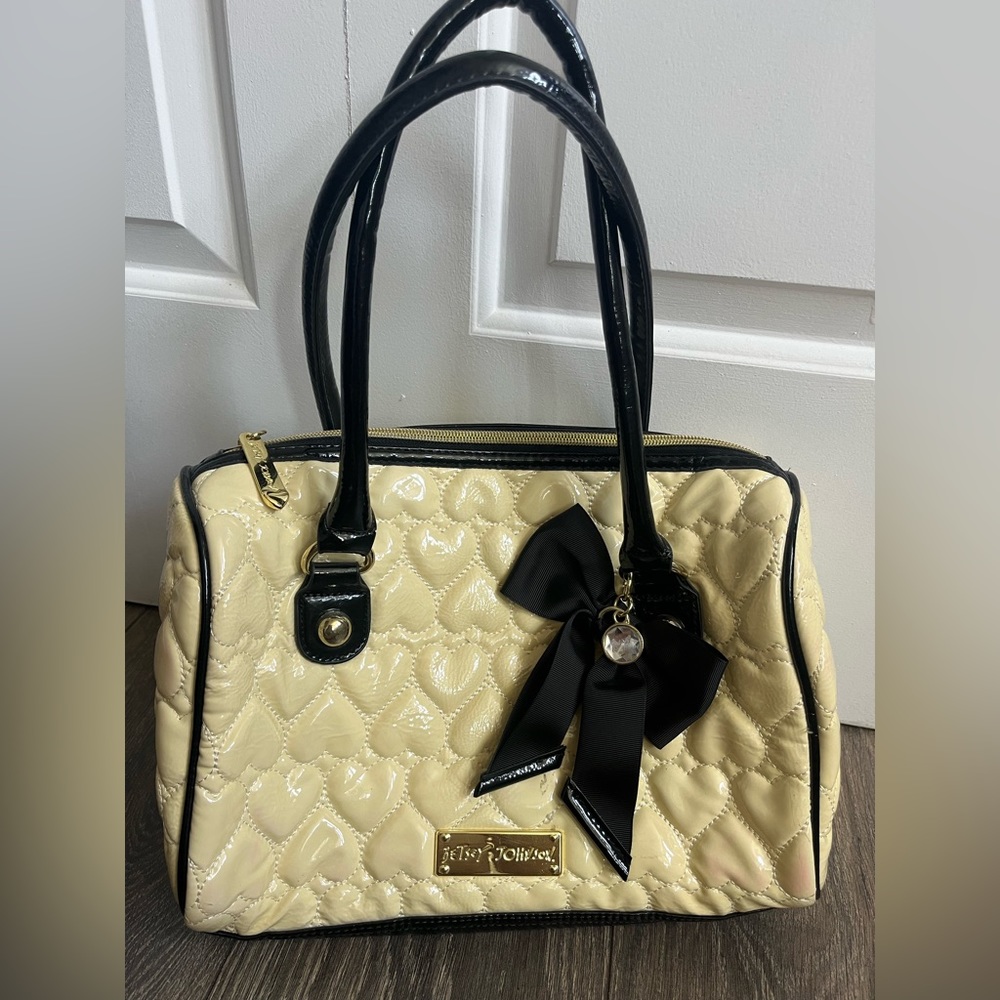 Betsey Johnson Cream Quilted Patent Satchel with Black Trim & Bow